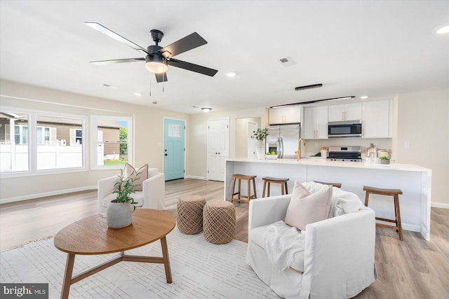 214 Kennard Ave, Edgewood, MD 21040 - living room featuring baseboards, light wood-type flooring, recessed lighting, and ceiling fan