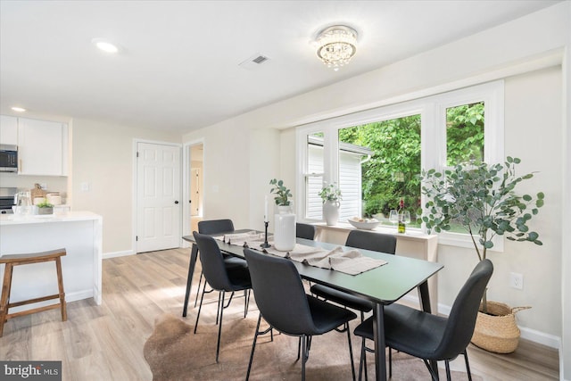 214 Kennard Ave, Edgewood, MD 21040 - dining area featuring light wood-style flooring, baseboards, recessed lighting, and a chandelier