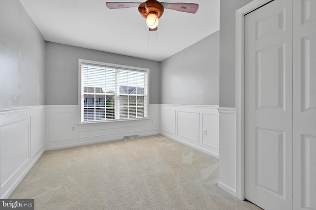 82 Grayson Ave, East Earl, PA 17519 - carpeted spare room with a wainscoted wall, ceiling fan, and a decorative wall