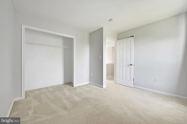 82 Grayson Ave, East Earl, PA 17519 - unfurnished bedroom featuring light colored carpet, baseboards, and a closet