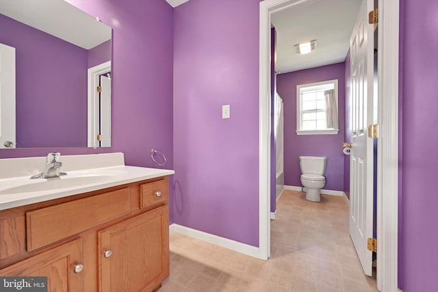 82 Grayson Ave, East Earl, PA 17519 - full bathroom with toilet, vanity, baseboards, and shower / bath combination with curtain