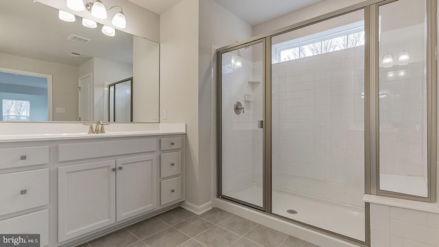 139 Erica Ln, Columbia, PA 17512 - full bath with tile patterned floors, a shower stall, vanity, and baseboards