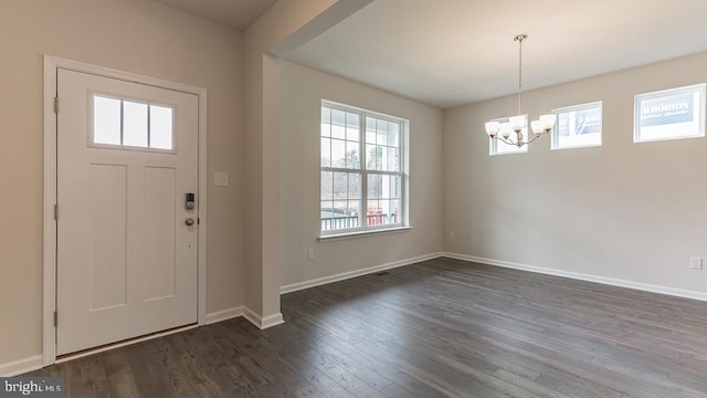 139 Erica Ln, Columbia, PA 17512 - foyer entrance with a chandelier, healthy amount of natural light, dark wood-style flooring, and baseboards