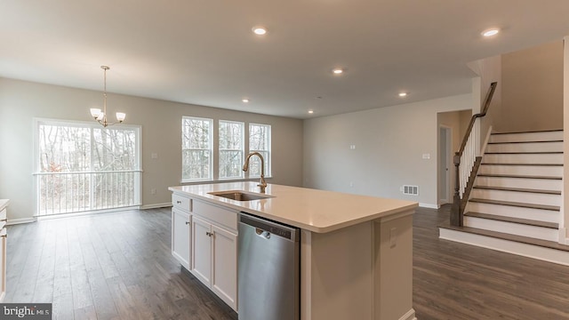 139 Erica Ln, Columbia, PA 17512 - kitchen featuring a sink, dishwasher, dark wood finished floors, white cabinetry, and a chandelier
