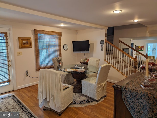 2834 E Boss Arnold Rd, Jefferson, MD 21755 - dining space with stairway, wood finished floors, and baseboards