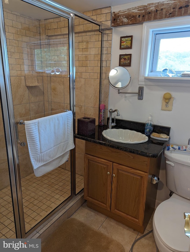 2834 E Boss Arnold Rd, Jefferson, MD 21755 - bathroom featuring a shower stall, toilet, tile patterned flooring, and vanity