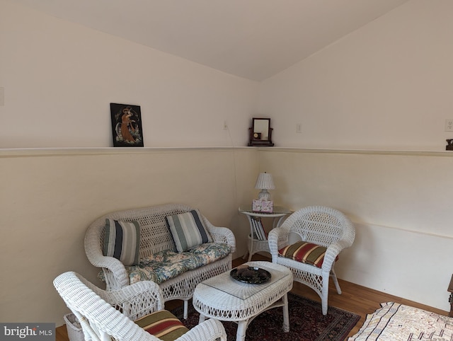 2834 E Boss Arnold Rd, Jefferson, MD 21755 - sitting room with wood finished floors, vaulted ceiling, and baseboards