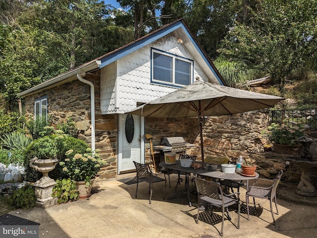 2834 E Boss Arnold Rd, Jefferson, MD 21755 - view of patio featuring a grill and outdoor dining area