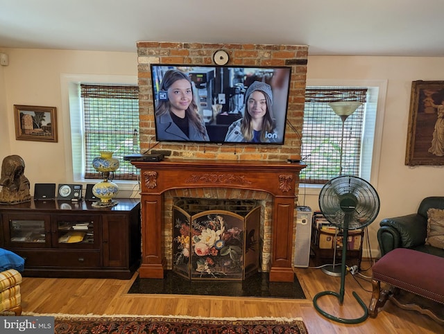 2834 E Boss Arnold Rd, Jefferson, MD 21755 - sitting room featuring wood finished floors and a fireplace