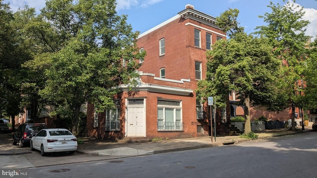 1202 Bolton St, Baltimore, MD 21217 - view of front facade featuring brick siding