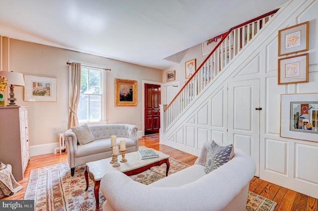 315 Linden Ave, Doylestown, PA 18901 - living area featuring stairway, wood finished floors, and baseboards