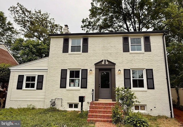 5141 10th St N, Arlington, VA 22205 - colonial home with a chimney and brick siding