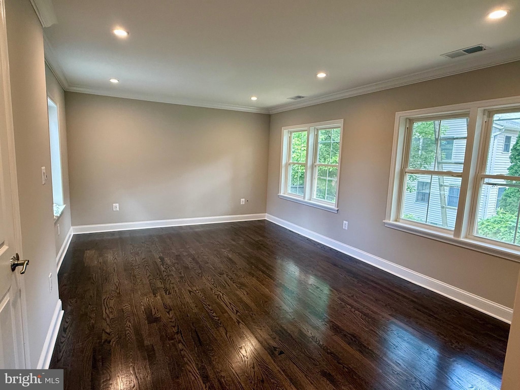 5141 10th St N, Arlington, VA 22205 - spare room featuring crown molding, dark wood-style floors, baseboards, and recessed lighting