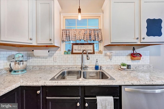 96 Billerbeck St, New Oxford, PA 17350 - kitchen featuring dishwasher, a sink, tasteful backsplash, and white cabinetry
