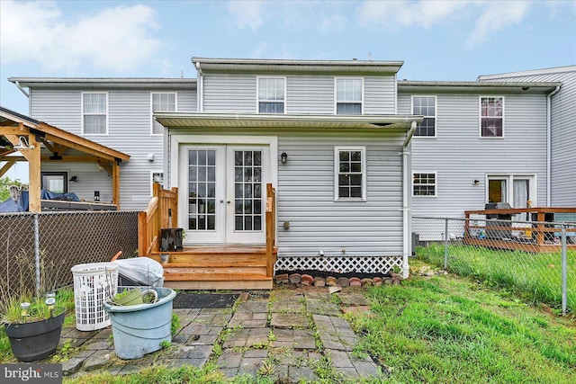 96 Billerbeck St, New Oxford, PA 17350 - rear view of property featuring french doors, a fenced backyard, and a deck