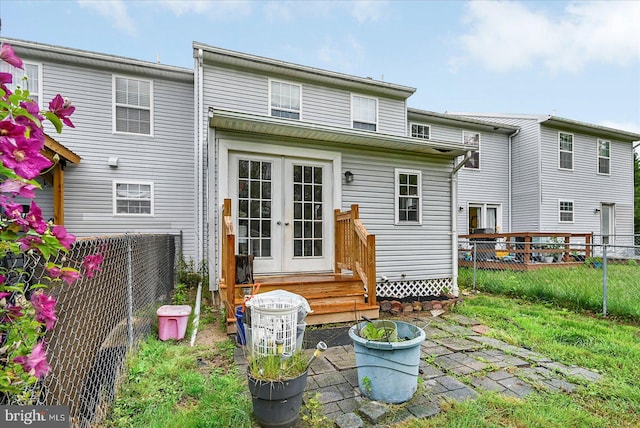 96 Billerbeck St, New Oxford, PA 17350 - rear view of house with french doors and a fenced backyard