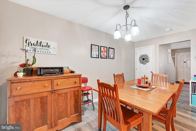 96 Billerbeck St, New Oxford, PA 17350 - dining space with light wood-style floors, a chandelier, and baseboards