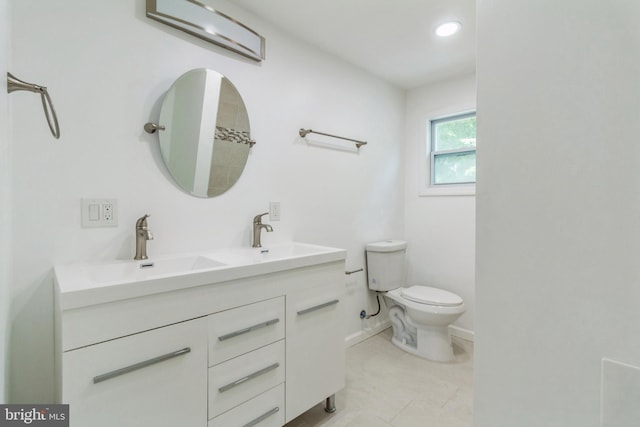 229 Shoemaker Rd, Bridgeton, NJ 08302 - full bath with toilet, double vanity, recessed lighting, and baseboards