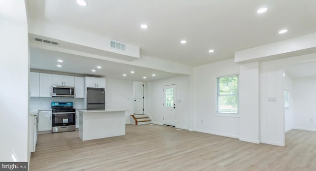 229 Shoemaker Rd, Bridgeton, NJ 08302 - kitchen with stainless steel appliances, light wood-style floors, recessed lighting, light countertops, and a center island