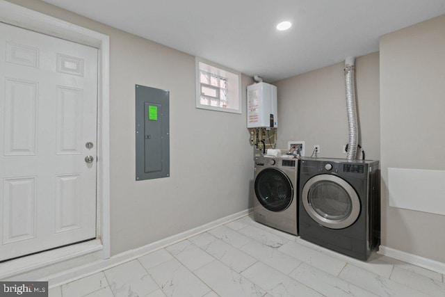 101 Poppleton St, Baltimore, MD 21201 - laundry area with electric panel, water heater, light marble finish floors, separate washer and dryer, and baseboards
