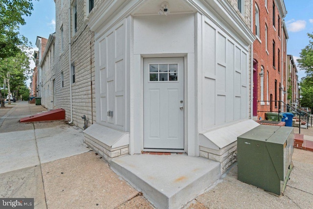 101 Poppleton St, Baltimore, MD 21201 - property entrance featuring board and batten siding