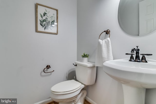 830 Willow Way, Prince Frederick, MD 20678 - half bath with toilet, a sink, and baseboards