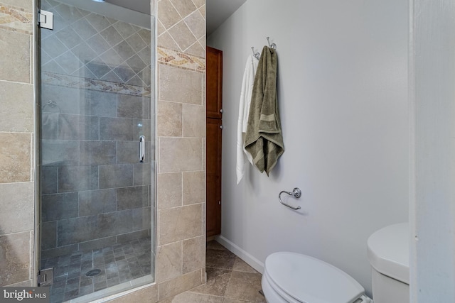 830 Willow Way, Prince Frederick, MD 20678 - bathroom featuring toilet, a shower stall, and baseboards