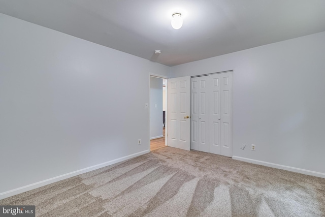 830 Willow Way, Prince Frederick, MD 20678 - unfurnished bedroom with carpet flooring, baseboards, and a closet
