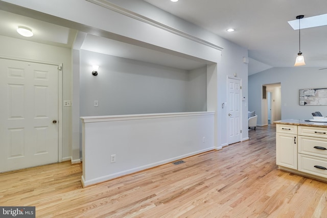 830 Willow Way, Prince Frederick, MD 20678 - kitchen featuring light wood-style floors, pendant lighting, baseboards, recessed lighting, and white cabinetry