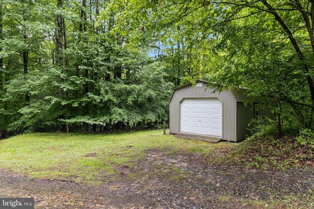 830 Willow Way, Prince Frederick, MD 20678 - view of yard featuring an outdoor structure and a garage