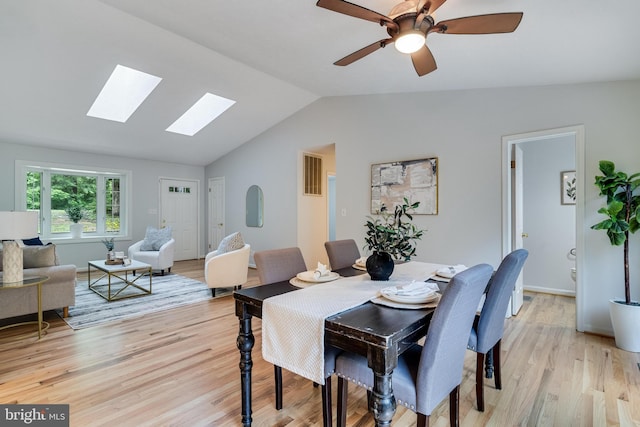 830 Willow Way, Prince Frederick, MD 20678 - dining area with lofted ceiling, a skylight, light wood-style flooring, and a ceiling fan