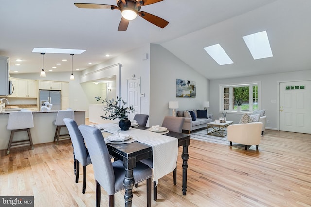 830 Willow Way, Prince Frederick, MD 20678 - dining area with a skylight, light wood-style floors, lofted ceiling, a ceiling fan, and recessed lighting