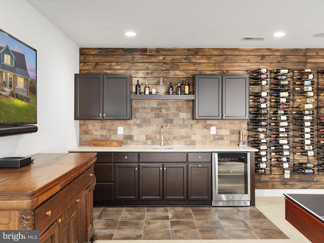 103 Titmouse Ct, Lake Frederick, VA 22630 - indoor wet bar featuring beverage cooler, backsplash, and recessed lighting