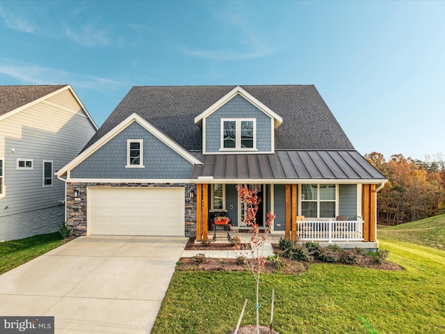 103 Titmouse Ct, Lake Frederick, VA 22630 - craftsman inspired home with a porch, a standing seam roof, driveway, a garage, and a front lawn
