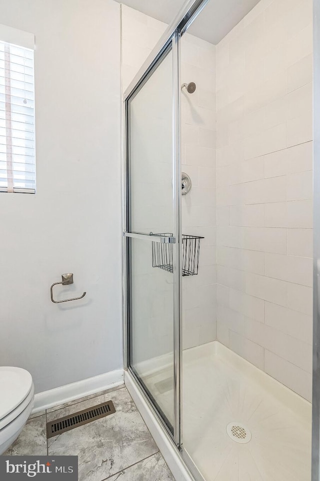 1808 Sara Ave, Severn, MD 21144 - bathroom with a stall shower, baseboards, and toilet