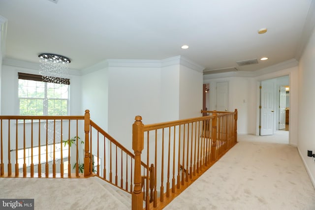 5736 Caribbean Ct, Haymarket, VA 20169 - hallway with an upstairs landing, carpet floors, recessed lighting, ornamental molding, and a chandelier