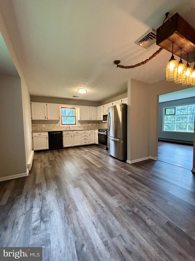 304 Rosedale Ave, Highspire, PA 17034 - kitchen featuring stainless steel appliances, healthy amount of natural light, white cabinets, and a sink