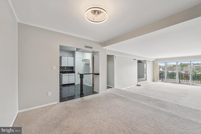 3601 Clarks Ln Unit 424, Baltimore, MD 21215 - spare room featuring carpet flooring and baseboards