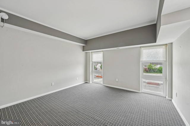3601 Clarks Ln Unit 424, Baltimore, MD 21215 - empty room with carpet flooring and baseboards