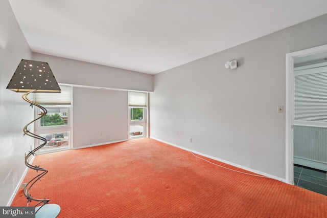 3601 Clarks Ln Unit 424, Baltimore, MD 21215 - spare room featuring carpet and baseboards