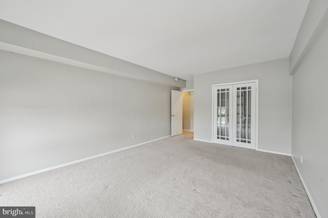 3601 Clarks Ln Unit 424, Baltimore, MD 21215 - empty room featuring carpet floors and baseboards