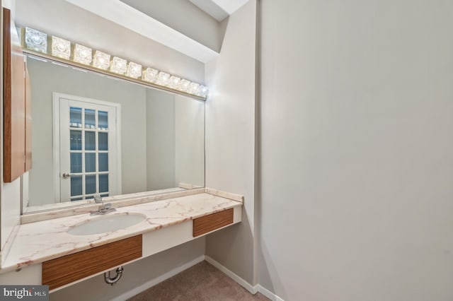 3601 Clarks Ln Unit 424, Baltimore, MD 21215 - bathroom featuring vanity and baseboards