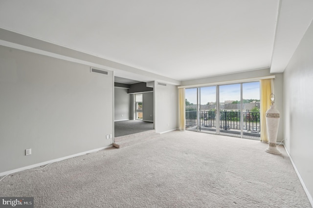 3601 Clarks Ln Unit 424, Baltimore, MD 21215 - spare room with carpet floors and baseboards