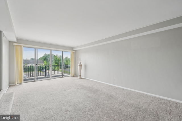 3601 Clarks Ln Unit 424, Baltimore, MD 21215 - carpeted spare room featuring baseboards