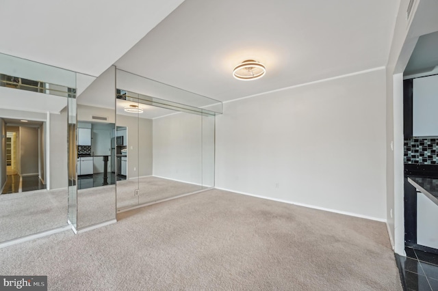 3601 Clarks Ln Unit 424, Baltimore, MD 21215 - carpeted empty room featuring baseboards
