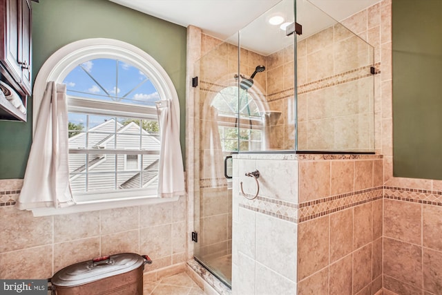 5441 Gladewright Dr, Centreville, VA 20120 - full bathroom featuring tile walls, a shower stall, wainscoting, and recessed lighting
