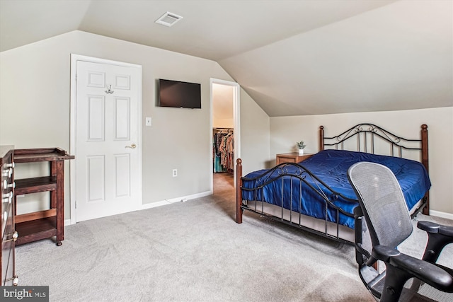 5441 Gladewright Dr, Centreville, VA 20120 - carpeted bedroom featuring vaulted ceiling, a spacious closet, baseboards, and a closet