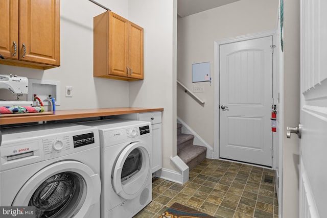 20843 Country Rd, Georgetown, DE 19947 - laundry area with washer and dryer, cabinet space, stone finish flooring, and baseboards