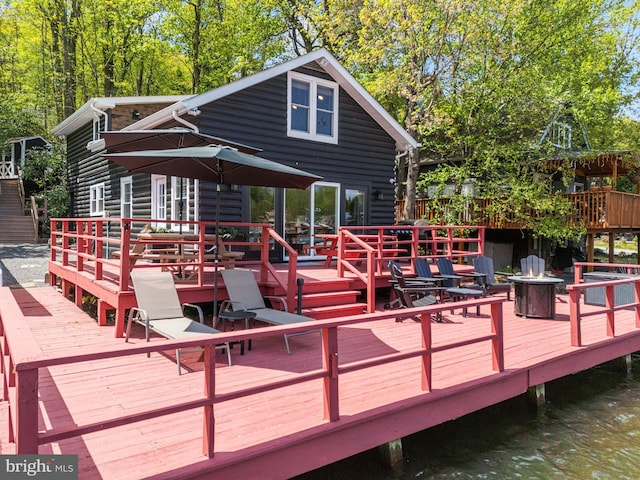 36 S Lake Dr, Lake Harmony, PA 18624 - deck with a water view and a fire pit