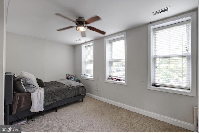 1316 Irving St NW, Washington, DC 20010 - bedroom featuring carpet flooring, baseboards, multiple windows, and ceiling fan